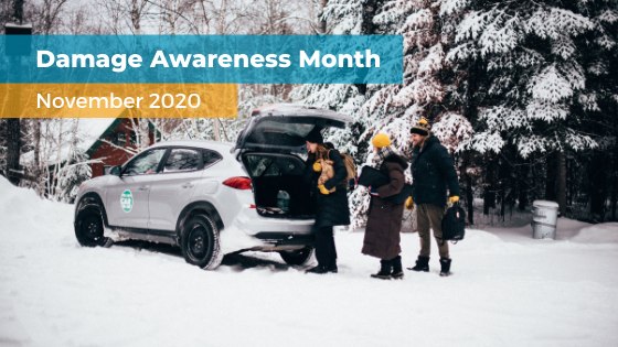 Damage awareness Month, peg city car on snowy road, people unloading supplies
