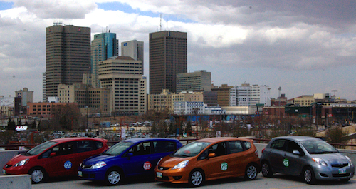 Winnipeg Skyline and 4 Peg City Car Co-op Cars 2013
