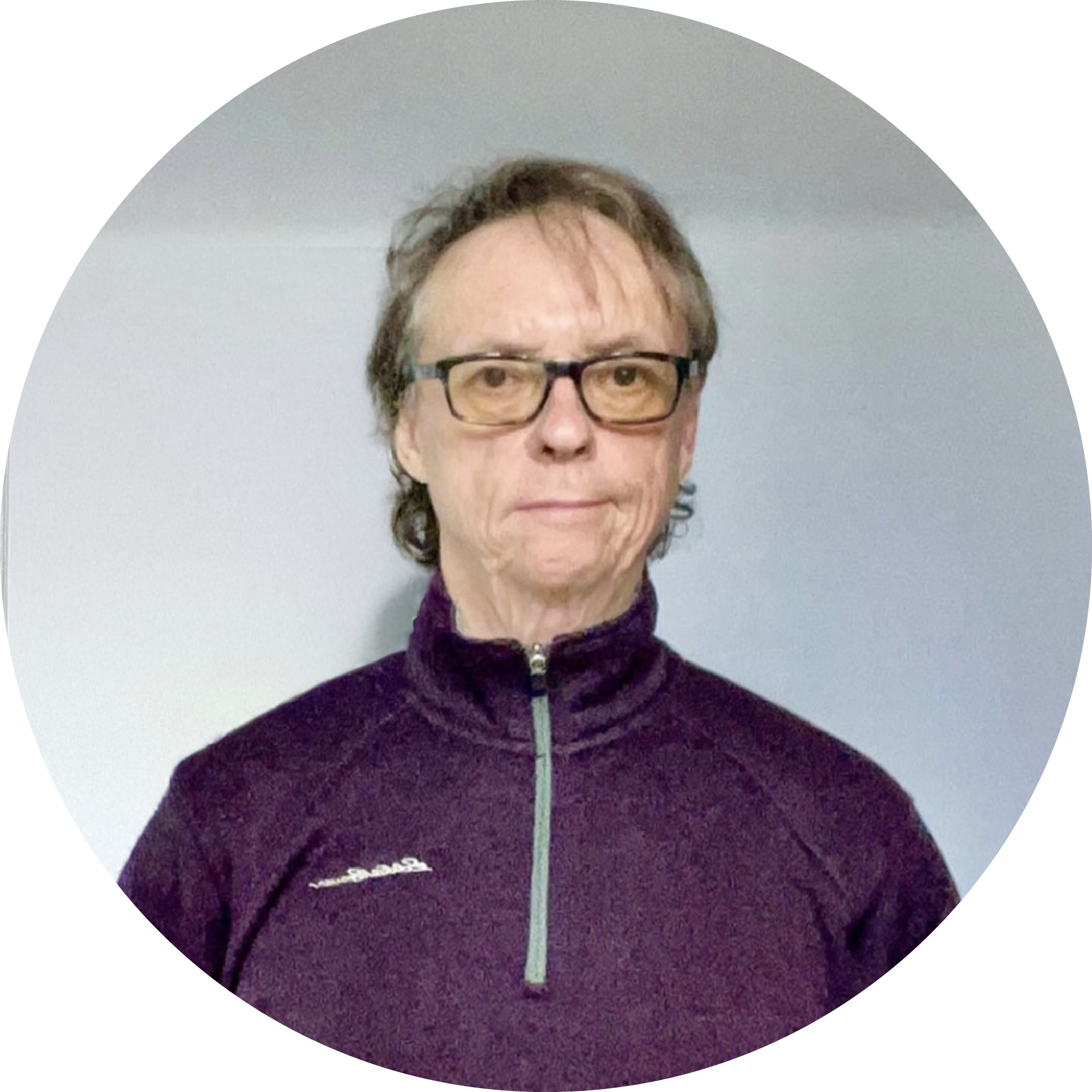 Mike McKenna, smiling slightly into the camera